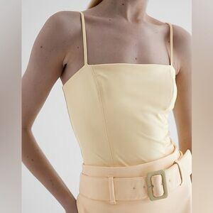 NWT Express Body Contour Faux Leather Cami Bodysuit in Pale Yellow size XL